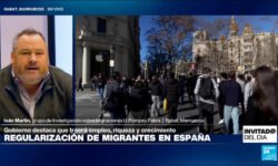 ¿Qué factores impulsaron la regularización de 500.000 migrantes en España?